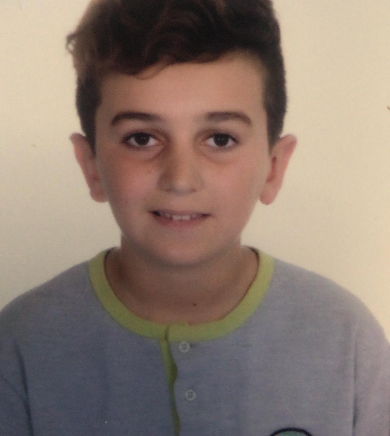 ALİ ÜZÜM